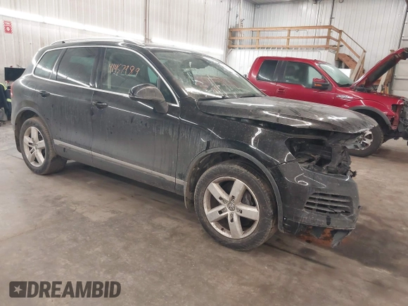 2012 Volkswagen Touareg Sport with VIN WVGEF9BP8CD009511, listed as a IAAI auction lot 41457989 with 87,325 mi miles and . Bid and sale history available at DreamBid. Image 1.