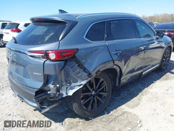 2021 Mazda CX-9 Carbon Edition with VIN JM3TCADY9M0517174, listed as a IAAI auction lot 41871485 with 48,484 mi miles and . Bid and sale history available at DreamBid. Image 4.