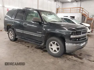 2002 Chevrolet Tahoe LT z VIN 1GNEK13Z72J197690, wystawiony jako IAAI lot #42487406 z przebiegiem 262 624 mil mil oraz . Historia ofert i sprzedaży dostępna na DreamBid. Obrazek 1.