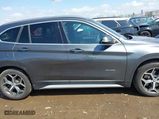 2016 BMW X1 xDrive28i with VIN WBXHT3C35GP886094, listed as a IAAI auction lot 42009639 with 61,739 mi miles. Bid and sale history available at carsss.com. Image 13.