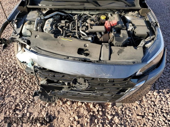 2024 Nissan Sentra S z VIN 3N1AB8BV3RY293064, wystawiony jako Copart lot #58260125 z przebiegiem 21 997 mil mil oraz Szkoda całkowita • Salvage title. Historia ofert i sprzedaży dostępna na DreamBid. Obrazek 11.