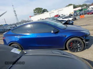 2022 Tesla Model Y Performance with VIN 7SAYGDEF7NF497076, listed as a IAAI auction lot 41759793 with 46,970 mi miles and . Bid and sale history available at DreamBid. Image 13.