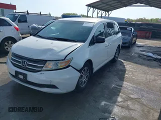 2011 Honda Odyssey EX-L with VIN 5FNRL5H6XBB059162, listed as a IAAI auction lot 42061378 with 164,317 mi miles and . Bid and sale history available at carsss.com. Image 19.