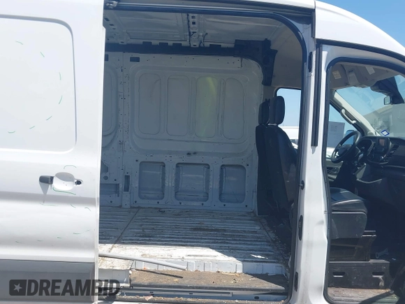 2021 Ford Transit Cargo with VIN 1FTBR1C8XMKA64837, listed as a IAAI auction lot 42008582 with 74,562 mi miles and . Bid and sale history available at DreamBid. Image 8.