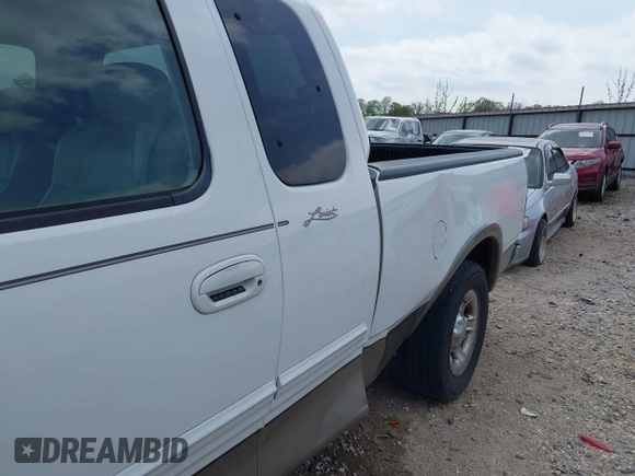 2003 Ford F-150 XL with VIN 1FTRX17L33NB79733, listed as a IAAI auction lot 42023385 with 136,236 mi miles. Bid and sale history available at carsss.com. Image 6.