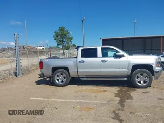 2015 Chevrolet Silverado 1500 LTZ with VIN 3GCUKSEC6FG510061, listed as a IAAI auction lot 40384385 with 156,882 mi miles. Bid and sale history available at carsss.com. Image 13.
