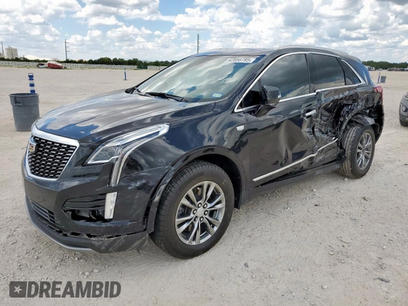 2021 Cadillac XT5 FWD Premium Luxury with VIN 1GYKNCRS0MZ100515, listed as a Copart auction lot 62856785 with 50,298 mi miles and Salvage title. Bid and sale history available at DreamBid. Image 1.