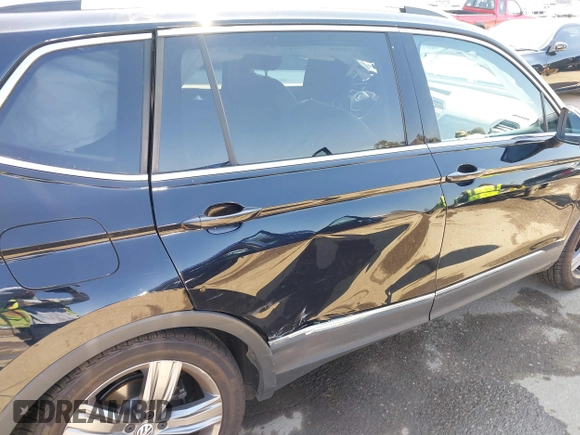 2021 Volkswagen Tiguan SE with VIN 3VV3B7AX1MM045478, listed as a IAAI auction lot 41947899 with 56,694 mi miles and . Bid and sale history available at DreamBid. Image 6.