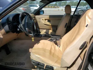 1995 BMW 3 Series 318iC with VIN WBABK5321SEC84192, listed as a Copart auction lot 69299564 with 199,105 mi miles and Salvage Title. Bid and sale history available at carsss.com. Image 7.