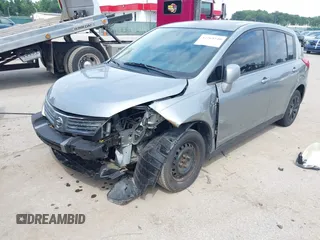 2009 Nissan Versa S with VIN 3N1BC13E39L368561, listed as a IAAI auction lot 42769540 with 119,356 mi miles and . Bid and sale history available at DreamBid. Image 2.