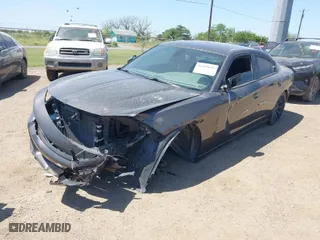 2016 Dodge Charger SE with VIN 2C3CDXBG1GH174724, listed as a IAAI auction lot 42019643 with 81,300 mi miles. Bid and sale history available at carsss.com. Image 2.