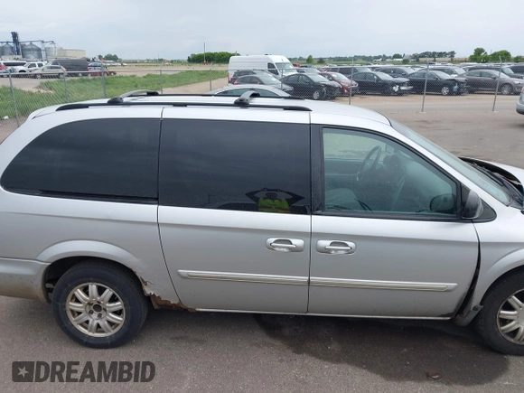 2006 Chrysler Town & Country Touring z VIN 2A4GP54L96R730719, wystawiony jako IAAI lot #42363419 z przebiegiem 186 173 mil mil oraz . Historia ofert i sprzedaży dostępna na DreamBid. Obrazek 13.