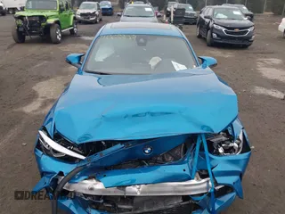 2021 BMW M2 Competition z VIN WBS2U7C02M7H63454, wystawiony jako IAAI lot #41063808 z przebiegiem 15 047 mil mil oraz . Historia ofert i sprzedaży dostępna na DreamBid. Obrazek 12.