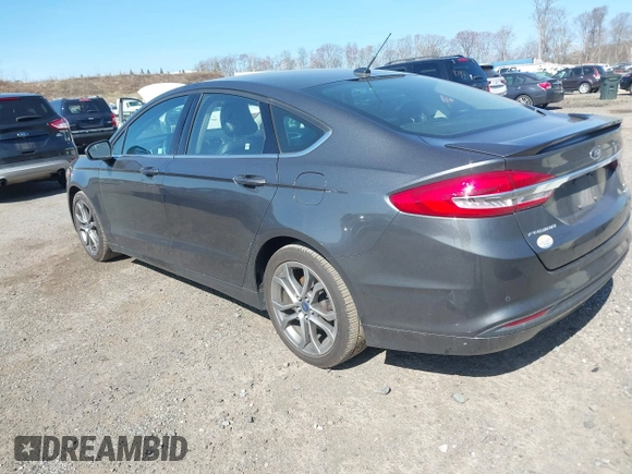 2017 Ford Fusion SE z VIN 3FA6P0HD8HR211638, wystawiony jako IAAI lot #42029399 z przebiegiem 90 262 mil mil oraz . Historia ofert i sprzedaży dostępna na DreamBid. Obrazek 3.