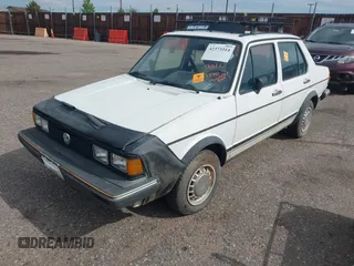 1982 Volkswagen Jetta z VIN WVWGA9161CW521961, wystawiony jako IAAI lot #42373314 z przebiegiem 52 051 mil mil oraz . Historia ofert i sprzedaży dostępna na DreamBid. Obrazek 2.