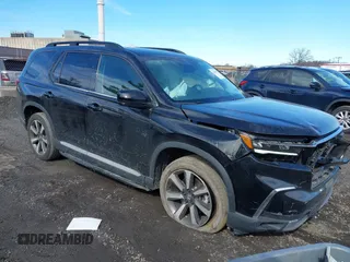 2023 Honda Pilot Elite with VIN 5FNYG1H85PB008069, listed as a IAAI auction lot 41588517 with 26,225 mi miles and . Bid and sale history available at DreamBid. Image 1.