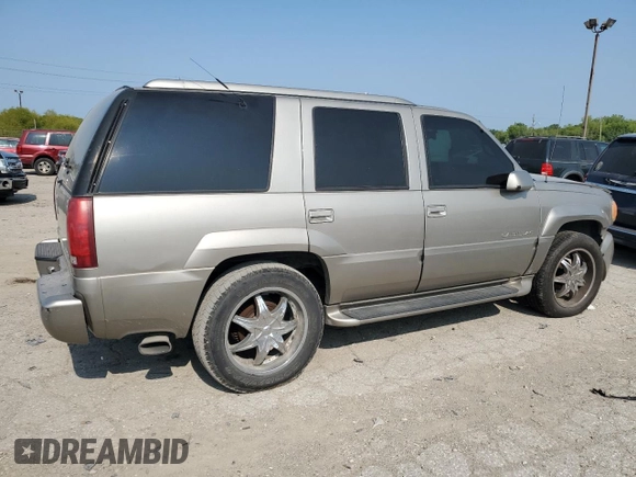2000 Cadillac Escalade z VIN 1GYEK63R2YR210601, wystawiony jako Copart lot #64108944 z przebiegiem 186 964 mil mil oraz Szkoda całkowita • Salvage title. Historia ofert i sprzedaży dostępna na DreamBid. Obrazek 3.