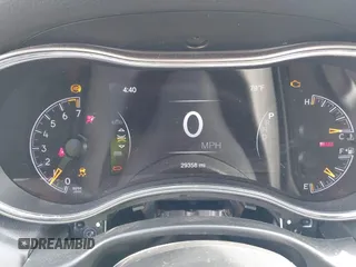 2021 Jeep Grand Cherokee Laredo E with VIN 1C4RJEAG0MC571375, listed as a IAAI auction lot 42087648 with 29,358 mi miles and . Bid and sale history available at DreamBid. Image 7.