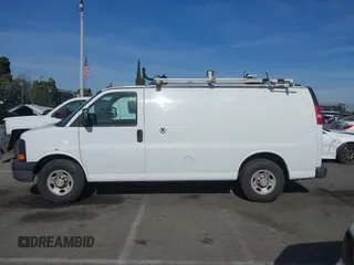 2014 Chevrolet Express Cargo Van with VIN 1GCWGFCB2E1122236, listed as a IAAI auction lot 41381131 with 70,696 mi miles. Bid and sale history available at carsss.com. Image 14.