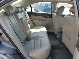 2010 Ford Fusion Hybrid z VIN 3FADP0L33AR267806, wystawiony jako Copart lot #55952815 z przebiegiem 146 912 mil mil oraz Szkoda całkowita • Salvage title. Historia ofert i sprzedaży dostępna na DreamBid. Obrazek 10.
