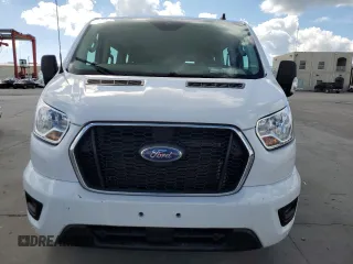 2022 Ford Transit Passenger XL with VIN 1FBAX2Y84NKA83986, listed as a Copart auction lot 77745014 with Not Provided miles and Salvage Title. Bid and sale history available at DreamBid. Image 5.
