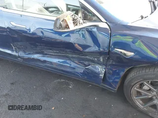 2018 Tesla Model 3 Long Range Battery z VIN 5YJ3E1EA8JF014706, wystawiony jako IAAI lot #41453650 z przebiegiem 68 037 mil mil oraz . Historia ofert i sprzedaży dostępna na DreamBid. Obrazek 6.