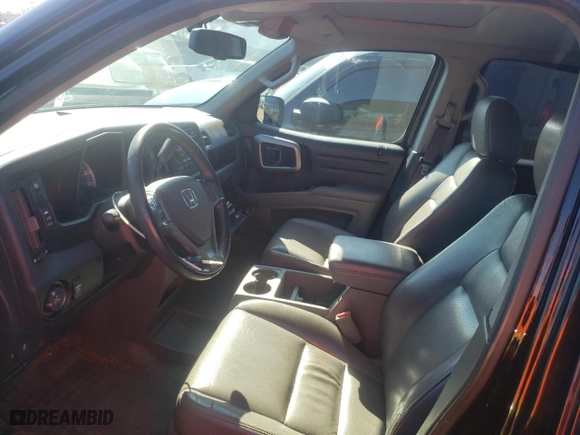2013 Honda Ridgeline RTL with VIN 5FPYK1F53DB011174, listed as a Copart auction lot 49956805 with 235,485 mi miles and Clean Title. Bid and sale history available at carsss.com. Image 7.