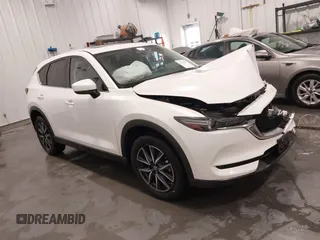 2017 Mazda CX-5 Grand Touring with VIN JM3KFBDL1H0203358, listed as a IAAI auction lot 41526776 with 63,167 mi miles. Bid and sale history available at carsss.com. Image 1.