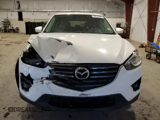 2016 Mazda CX-5 Grand Touring with VIN JM3KE4DYXG0836028, listed as a Copart auction lot 49279565 with 96,672 mi miles and Non Repairable. Bid and sale history available at carsss.com. Image 5.