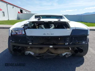 2009 Lamborghini Gallardo z VIN ZHWGU54T59LA07777, wystawiony jako IAAI lot #39749159 z przebiegiem 8730 mil mil oraz . Historia ofert i sprzedaży dostępna na DreamBid. Obrazek 17.