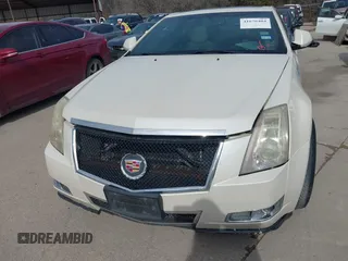 2011 Cadillac CTS Performance with VIN 1G6DJ1ED3B0142767, listed as a IAAI auction lot 41676404 with 238,027 mi miles and . Bid and sale history available at DreamBid. Image 6.