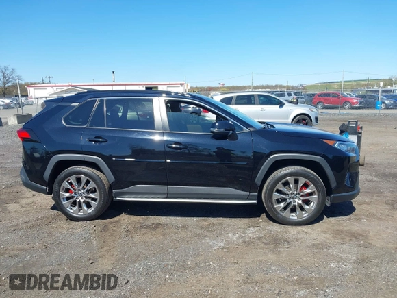 2021 Toyota RAV4 XLE Premium with VIN 2T3A1RFV6MC236809, listed as a IAAI auction lot 42056379 with 99,921 mi miles and . Bid and sale history available at DreamBid. Image 13.