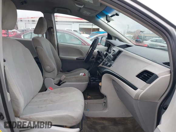 2012 Toyota Sienna with VIN 5TDZK3DC2CS221981, listed as a IAAI auction lot 41650273 with 146,652 mi miles. Bid and sale history available at carsss.com. Image 5.