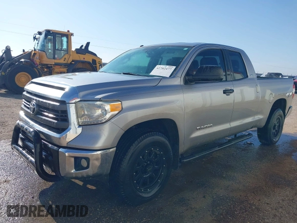 2014 Toyota Tundra SR with VIN 5TFRM5F13EX078411, listed as a IAAI auction lot 42702477 with 123,336 mi miles and . Bid and sale history available at DreamBid. Image 2.