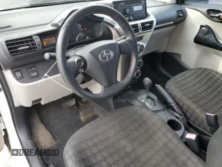 2012 Scion iQ with VIN JTNJJXB0XCJ011508, listed as a Copart auction lot 42368065 with 161,965 mi miles and Salvage title. Bid and sale history available at DreamBid. Image 8.