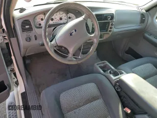 2003 Ford Explorer Sport XLS z VIN 1FMYU60E03UB97766, wystawiony jako Copart lot #82920774 z przebiegiem 131 273 mil mil oraz Tytuł czysty. Historia ofert i sprzedaży dostępna na DreamBid. Obrazek 8.