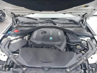 2017 BMW 2 Series with VIN WBA2M9C3XH7A47692, listed as a IAAI auction lot 42172525 with 69,504 mi miles and . Bid and sale history available at DreamBid. Image 10.