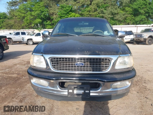 1998 Ford Expedition XLT with VIN 1FMRU1766WLC31063, listed as a IAAI auction lot 41959189 with 168,690 mi miles. Bid and sale history available at carsss.com. Image 6.