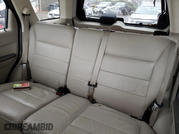2008 Ford Escape Hybrid with VIN 1FMCU59H48KC33656, listed as a Copart auction lot 48506585 with 166,880 mi miles and Salvage title. Bid and sale history available at DreamBid. Image 10.