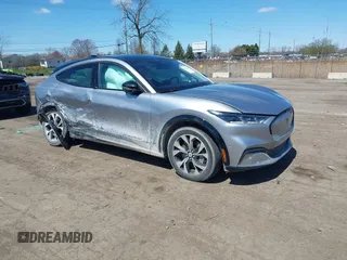 2021 Ford Mustang Mach-E Premium z VIN 3FMTK3SUXMMA43168, wystawiony jako IAAI lot #42049462 z przebiegiem 40 408 mil mil oraz . Historia ofert i sprzedaży dostępna na DreamBid. Obrazek 1.