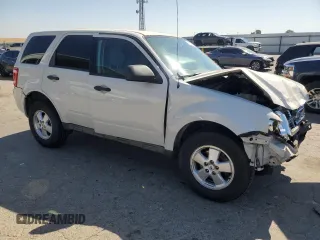 2012 Ford Escape XLS z VIN 1FMCU0C76CKB12316, wystawiony jako Copart lot #65011265 z przebiegiem 139 992 mil mil oraz Szkoda całkowita • Salvage title. Historia ofert i sprzedaży dostępna na DreamBid. Obrazek 4.
