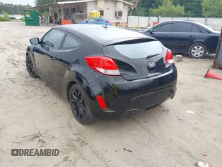 2013 Hyundai Veloster w/Black Int with VIN KMHTC6AD3DU084995, listed as a IAAI auction lot 42513920 with 103,595 mi miles and . Bid and sale history available at DreamBid. Image 3.