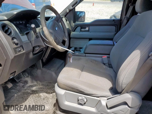 2014 Ford F-150 XL с VIN 1FTEW1CM0EKD79764, выставлен на аукционе Copart как лот 59053215 с пробегом 256 222 миль миль и Списание • Salvage title. История ставок и продаж доступна на DreamBid. Изображение 7.