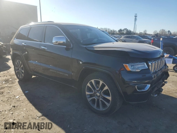 2017 Jeep Grand Cherokee Overland with VIN 1C4RJFCT7HC684746, listed as a Copart auction lot 83259314 with 106,848 mi miles and Salvage Title. Bid and sale history available at carsss.com. Image 4.