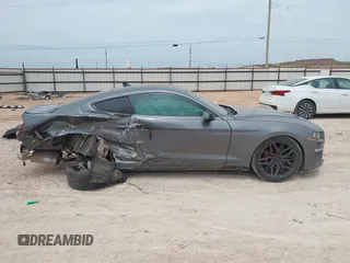 2022 Ford Mustang EcoBoost z VIN 1FA6P8TH2N5139990, wystawiony jako IAAI lot #42259683 z przebiegiem 62 580 mil mil oraz . Historia ofert i sprzedaży dostępna na DreamBid. Obrazek 14.