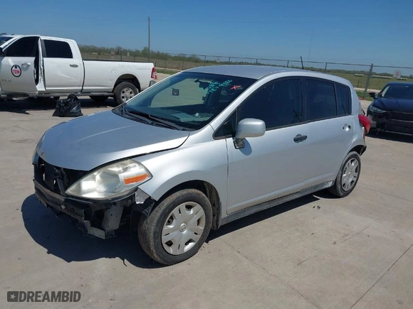 2010 Nissan Versa 1.8 S with VIN 3N1BC1CP7AL433675, listed as a IAAI auction lot 41879386 with 219,794 mi miles. Bid and sale history available at carsss.com. Image 2.