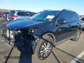 2017 Toyota RAV4 LE z VIN 2T3BFREV6HW543909, wystawiony jako IAAI lot #41668964 z przebiegiem 102 452 mil mil oraz . Historia ofert i sprzedaży dostępna na DreamBid. Obrazek 2.