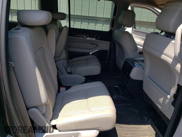 2022 Jeep Wagoneer Series III with VIN 1C4SJVDT8NS201275, listed as a Copart auction lot 63481615 with 57,569 mi miles and Salvage title. Bid and sale history available at DreamBid. Image 11.