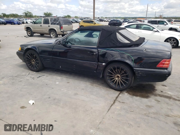 1999 Mercedes-Benz SL-Class with VIN WDBFA68F0XF182162, listed as a Copart auction lot 71390714 with 111,152 mi miles and Salvage Title. Bid and sale history available at carsss.com. Image 2.