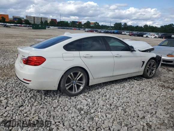 2015 BMW 4 Series 428i xDrive with VIN WBA4A7C53FD415066, listed as a Copart auction lot 61880545 with 130,874 mi miles and Salvage title. Bid and sale history available at DreamBid. Image 3.